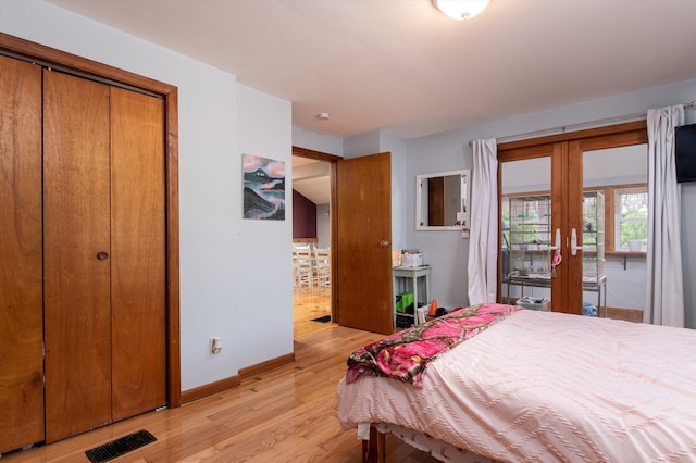 817 York Street Ext, Poultney, VT 05764 - bedroom with french doors, light wood-style flooring, and access to outside