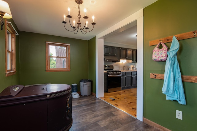 817 York Street Ext, Poultney, VT 05764 - full bathroom featuring wood finished floors, a chandelier, and vanity