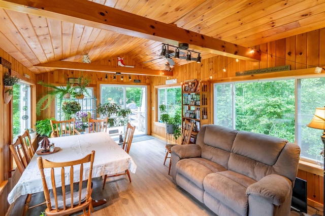 1307 Lime Kiln Rd, Haverhill, NH 03780 - dining area with wooden walls, light wood-style flooring, a ceiling fan, and wooden ceiling