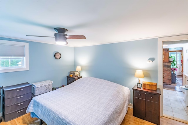 1307 Lime Kiln Rd, Haverhill, NH 03780 - bedroom featuring multiple windows, wood finished floors, crown molding, and a ceiling fan