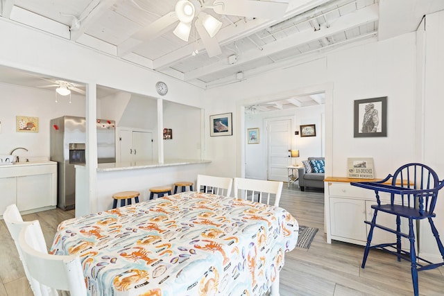 15 Ocean Blvd, Hampton, NH 03842 - dining area with a ceiling fan, light wood-style floors, and beam ceiling