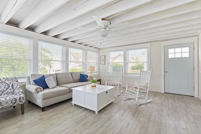15 Ocean Blvd, Hampton, NH 03842 - living area with beamed ceiling, plenty of natural light, light wood-type flooring, and a ceiling fan