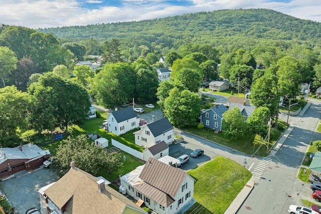 6 Davis Dr, Lebanon, NH 03766 - aerial perspective of suburban area featuring a heavily wooded area