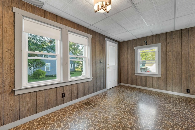 6 Davis Dr, Lebanon, NH 03766 - spare room with stone floors and wooden walls