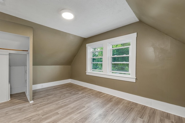 6 Davis Dr, Lebanon, NH 03766 - bonus room with lofted ceiling and wood finished floors