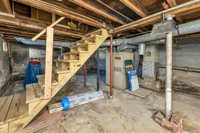 6 Davis Dr, Lebanon, NH 03766 - unfinished basement featuring stairway and heating unit