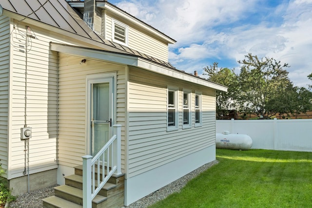 6 Davis Dr, Lebanon, NH 03766 - view of side of property featuring entry steps, a standing seam roof, and a metal roof