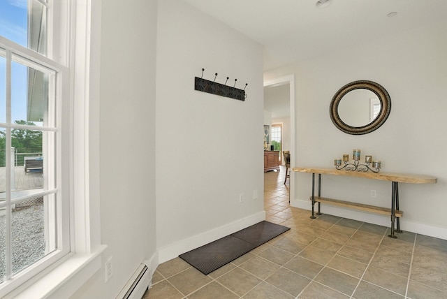 84 Shaw Rd, Northfield, NH 03276 - hall featuring tile patterned flooring and a baseboard heating unit