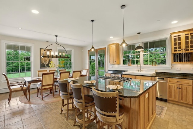 84 Shaw Rd, Northfield, NH 03276 - kitchen featuring a center island, recessed lighting, a kitchen bar, stainless steel gas cooktop, and pendant lighting