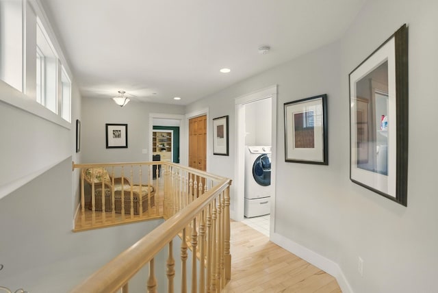 84 Shaw Rd, Northfield, NH 03276 - hallway with washer / dryer, an upstairs landing, light wood-style floors, and recessed lighting