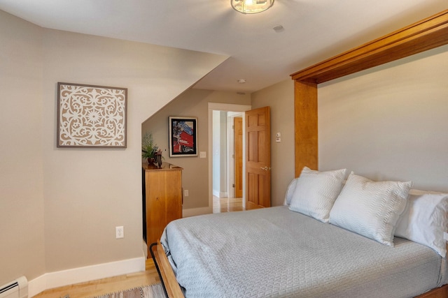 84 Shaw Rd, Northfield, NH 03276 - bedroom featuring a baseboard radiator and light wood finished floors
