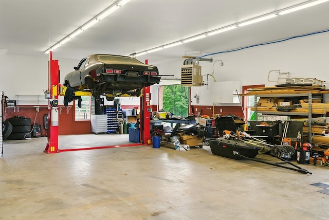 84 Shaw Rd, Northfield, NH 03276 - garage featuring a workshop area