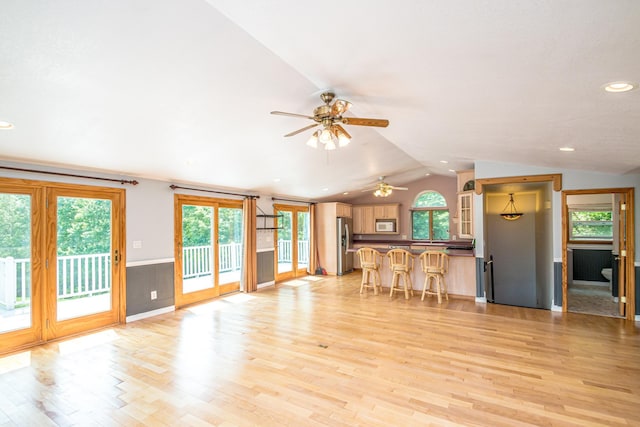 98 Rowell Rd, Lancaster, NH 03584 - living area with lofted ceiling, a ceiling fan, plenty of natural light, light wood finished floors, and recessed lighting