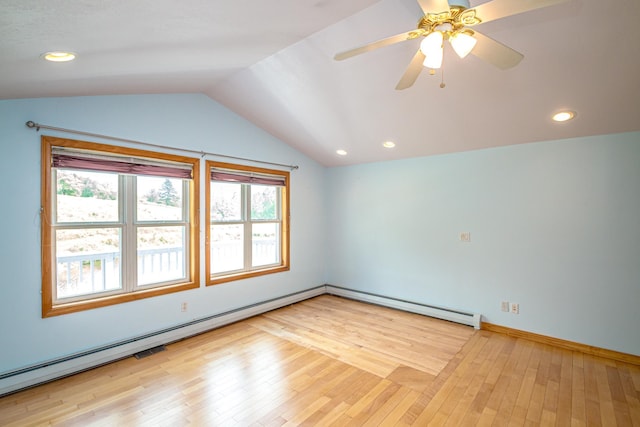 98 Rowell Rd, Lancaster, NH 03584 - unfurnished room featuring plenty of natural light, lofted ceiling, wood-type flooring, baseboard heating, and recessed lighting