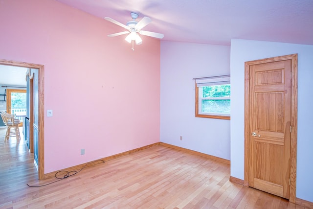 98 Rowell Rd, Lancaster, NH 03584 - spare room featuring light wood-style floors, ceiling fan, and lofted ceiling