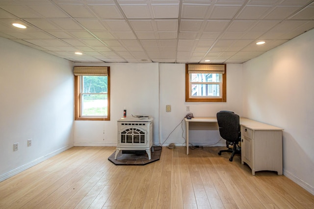 98 Rowell Rd, Lancaster, NH 03584 - office space with a wood stove, light wood-style flooring, and recessed lighting