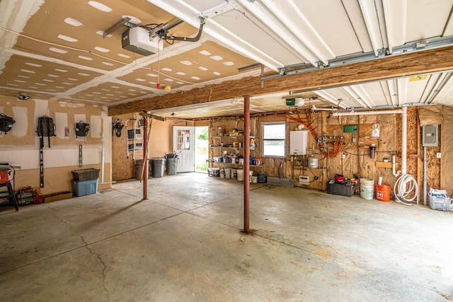 98 Rowell Rd, Lancaster, NH 03584 - garage featuring a garage door opener and electric panel