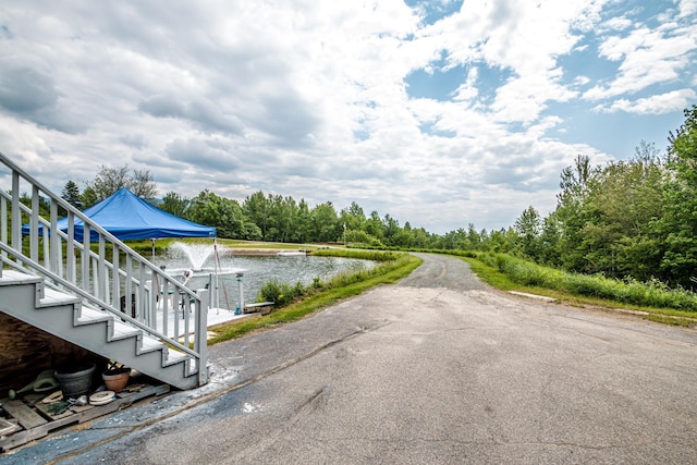 98 Rowell Rd, Lancaster, NH 03584 - view of road featuring a water view and stairway