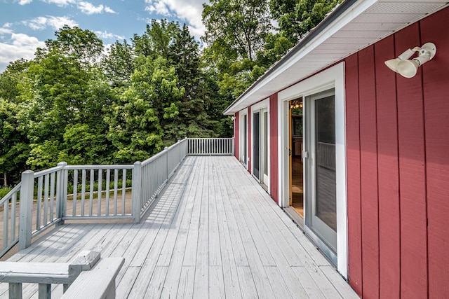 98 Rowell Rd, Lancaster, NH 03584 - wooden terrace with view of wooded area