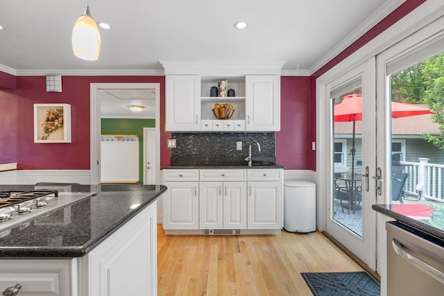 397 Strafford Rd, Strafford, NH 03844 - kitchen with stainless steel appliances, crown molding, white cabinets, light wood finished floors, and open shelves