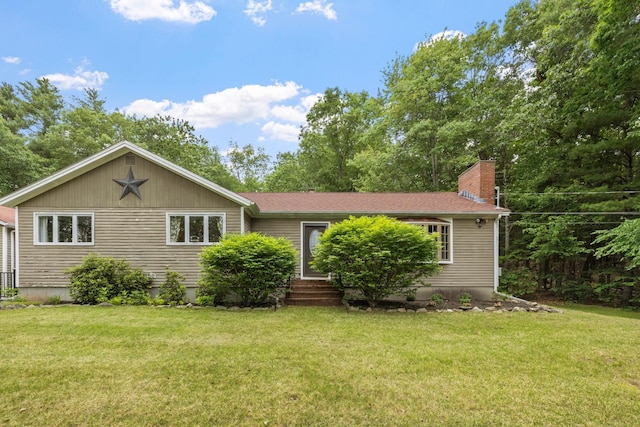 397 Strafford Rd, Strafford, NH 03844 - view of front facade with a front yard and a chimney