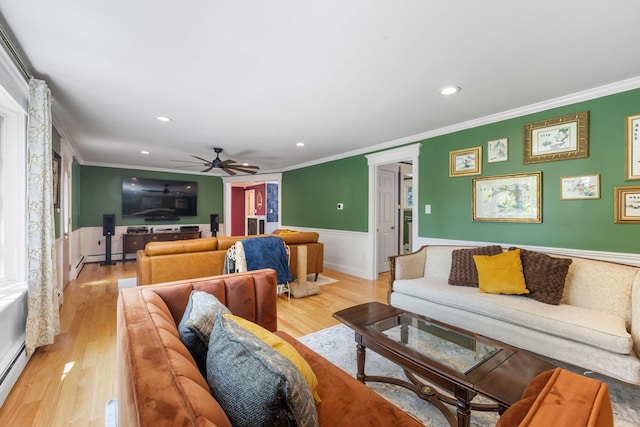 397 Strafford Rd, Strafford, NH 03844 - living area with crown molding, wainscoting, light wood-type flooring, ceiling fan, and recessed lighting