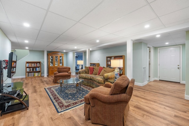 397 Strafford Rd, Strafford, NH 03844 - living area featuring light wood-style flooring, a paneled ceiling, and recessed lighting