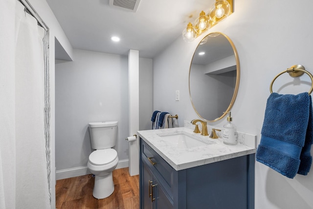 397 Strafford Rd, Strafford, NH 03844 - full bathroom with vanity, wood finished floors, a shower with curtain, and recessed lighting