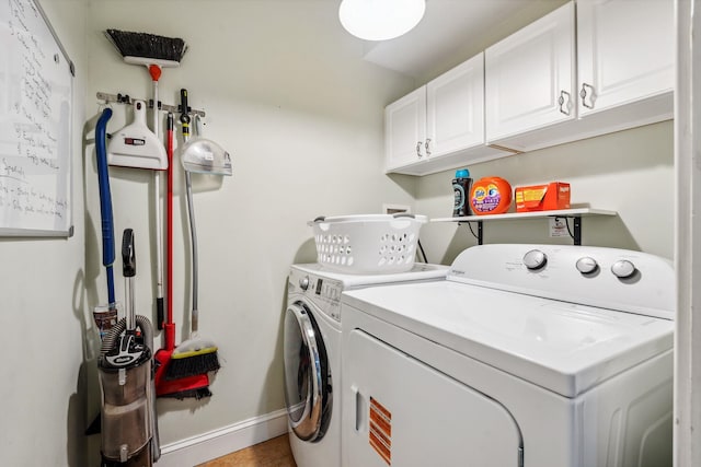 6 Walters Way, Exeter, NH 03833 - washroom featuring cabinet space, washer and clothes dryer, and tile patterned floors