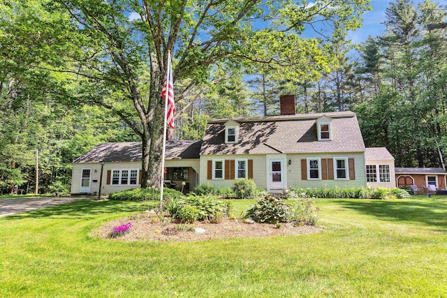 76 Cunningham Pond Rd, Peterborough, NH 03458 - dutch colonial with a chimney, a front lawn, and a shingled roof
