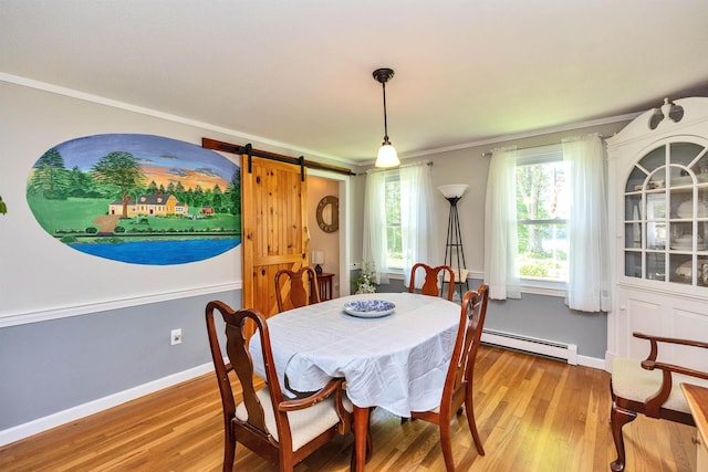 76 Cunningham Pond Rd, Peterborough, NH 03458 - dining room with baseboard heating, a barn door, light wood finished floors, and crown molding