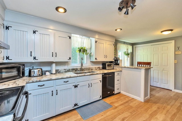76 Cunningham Pond Rd, Peterborough, NH 03458 - kitchen with stainless steel appliances, light wood-style flooring, a peninsula, light stone counters, and recessed lighting