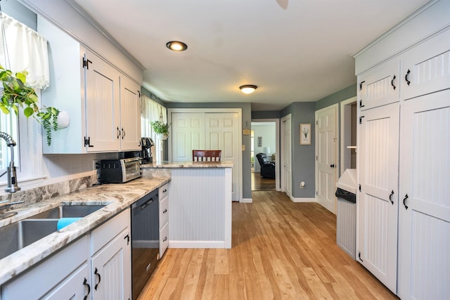 76 Cunningham Pond Rd, Peterborough, NH 03458 - kitchen with dishwasher, light wood-type flooring, white cabinetry, light stone counters, and a peninsula