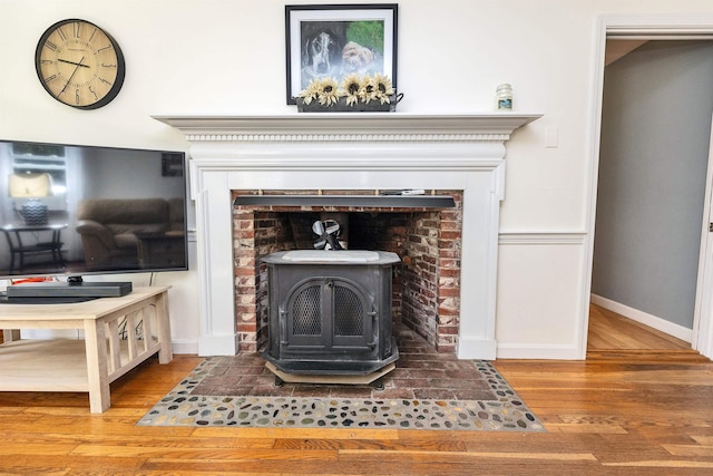 76 Cunningham Pond Rd, Peterborough, NH 03458 - detailed view of a wood stove and wood finished floors