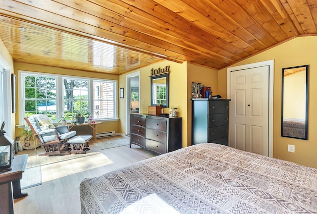 76 Cunningham Pond Rd, Peterborough, NH 03458 - bedroom featuring baseboard heating, vaulted ceiling, wooden ceiling, and wood finished floors