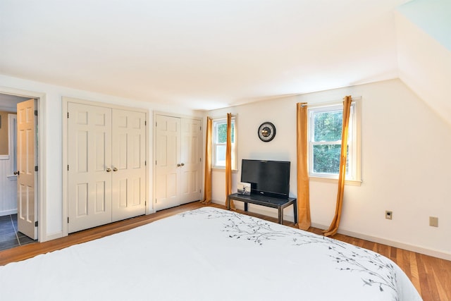 76 Cunningham Pond Rd, Peterborough, NH 03458 - bedroom featuring multiple closets and wood finished floors