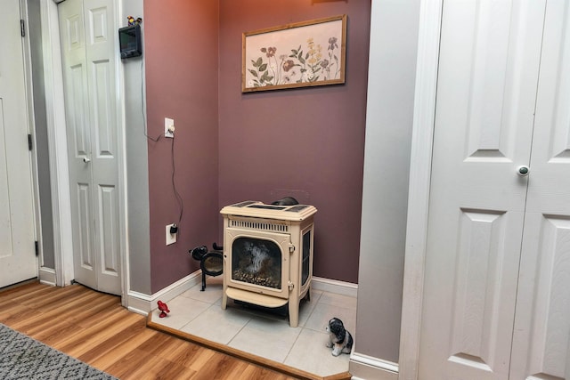 76 Cunningham Pond Rd, Peterborough, NH 03458 - detailed view of wood finished floors and a wood stove