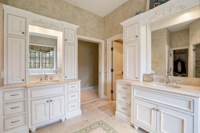 44 Buker Way, New London, NH 03257 - full bath featuring two vanities and tile patterned flooring