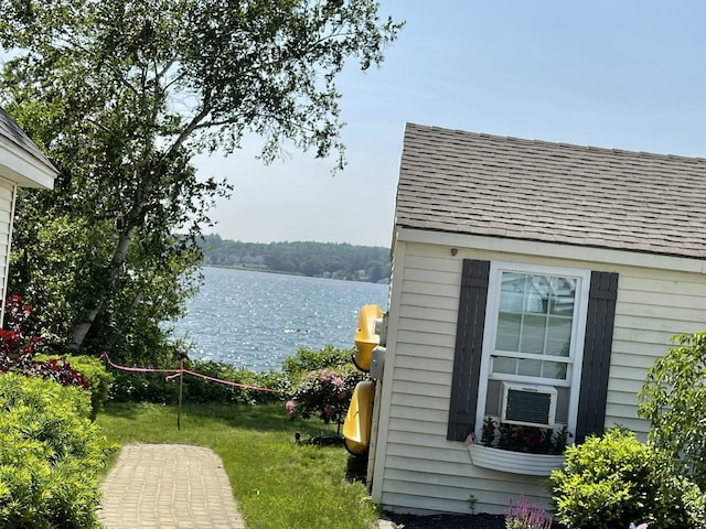 144 Lake St Unit 19, Laconia, NH 03246 - view of green lawn featuring a water view and cooling unit