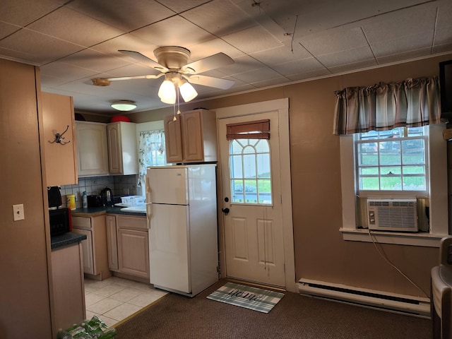 144 Lake St Unit 19, Laconia, NH 03246 - kitchen featuring freestanding refrigerator, baseboard heating, healthy amount of natural light, and cooling unit
