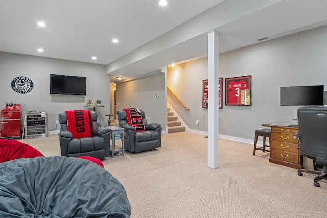 74 Childs Dr, Dover, NH 03820 - living room with carpet flooring, recessed lighting, beverage cooler, and stairway