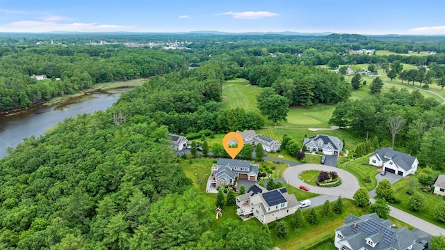 74 Childs Dr, Dover, NH 03820 - aerial view of a forest and a large body of water