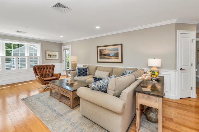 61 Acadia Ln Unit 309, Exeter, NH 03833 - living area featuring crown molding, a wainscoted wall, light wood finished floors, and recessed lighting