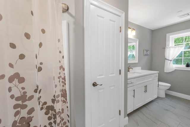 61 Acadia Ln Unit 309, Exeter, NH 03833 - bathroom with vanity, marble look tile flooring, and curtained shower