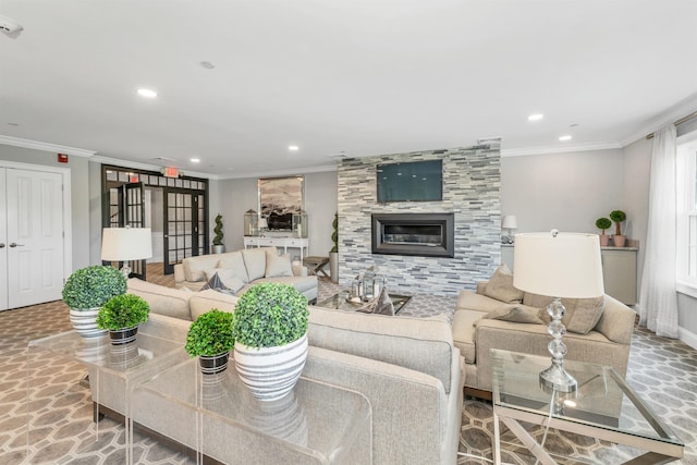 61 Acadia Ln Unit 309, Exeter, NH 03833 - living area featuring ornamental molding, recessed lighting, and a tile fireplace