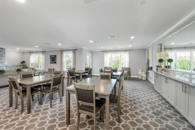 61 Acadia Ln Unit 309, Exeter, NH 03833 - dining space with recessed lighting, plenty of natural light, and ornamental molding