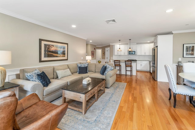 61 Acadia Ln Unit 309, Exeter, NH 03833 - living area featuring ornamental molding, recessed lighting, and light wood-type flooring
