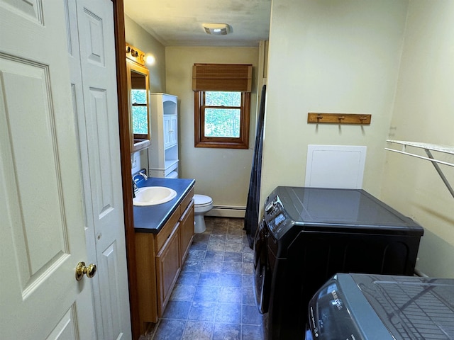 257 Crane St, Littleton, NH 03561 - full bathroom featuring vanity, washer and clothes dryer, and a baseboard heating unit