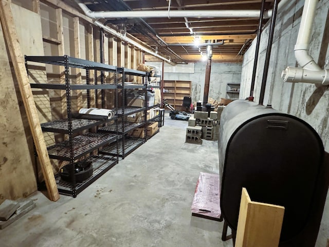 257 Crane St, Littleton, NH 03561 - unfinished basement with oil tank