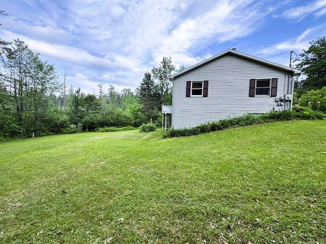 257 Crane St, Littleton, NH 03561 - view of property exterior with a lawn